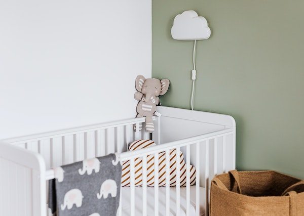 Your baby falling off the bed is a scary event for all parents. Here is what you should do in this case, along with tips to prevent it from happening.